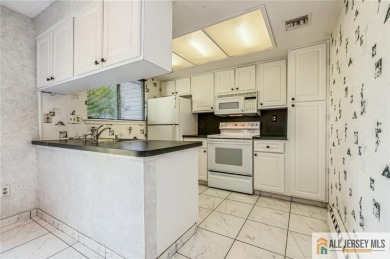 Just over 1000 sq ft, this cozy Timberline floor plan with 2b/2b on Clearbrook Golf Club in New Jersey - for sale on GolfHomes.com, golf home, golf lot