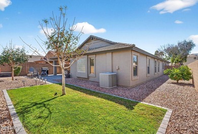 Located in the highly sought-after Johnson Ranch community, this on The Golf Club At Johnson Ranch in Arizona - for sale on GolfHomes.com, golf home, golf lot