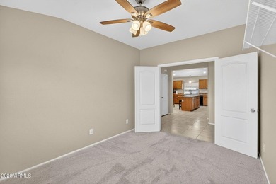 Located in the highly sought-after Johnson Ranch community, this on The Golf Club At Johnson Ranch in Arizona - for sale on GolfHomes.com, golf home, golf lot