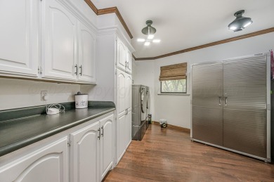 Brimming with charm, space, and updates, this stunning 3 bed, 3 on Palo Duro Creek Golf Club in Texas - for sale on GolfHomes.com, golf home, golf lot