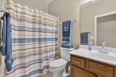 Located in the highly sought-after Johnson Ranch community, this on The Golf Club At Johnson Ranch in Arizona - for sale on GolfHomes.com, golf home, golf lot