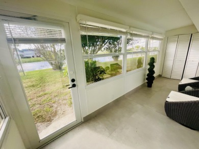 This is a must see new and custom designed CORNER VILLA! on Kings Point Golf -Flanders Way in Florida - for sale on GolfHomes.com, golf home, golf lot