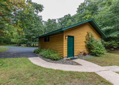 Location, Location, Location! Wooded serenity with the comforts on Minocqua Country Club in Wisconsin - for sale on GolfHomes.com, golf home, golf lot