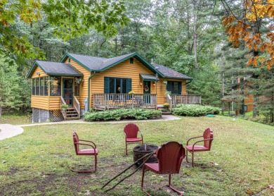 Location, Location, Location! Wooded serenity with the comforts on Minocqua Country Club in Wisconsin - for sale on GolfHomes.com, golf home, golf lot