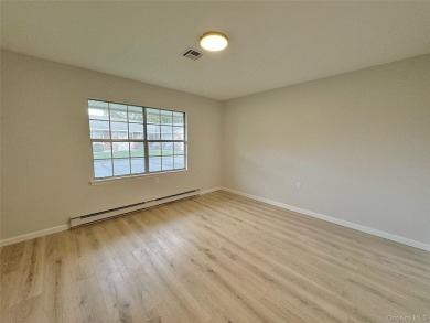 Welcome to 151B Eastbourne Ct, Largest Semi-Attached End Unit on Leisure Village Golf Course in New York - for sale on GolfHomes.com, golf home, golf lot