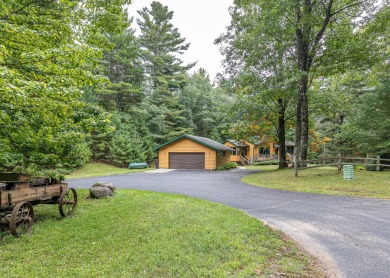 Location, Location, Location! Wooded serenity with the comforts on Minocqua Country Club in Wisconsin - for sale on GolfHomes.com, golf home, golf lot