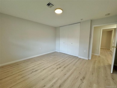 Welcome to 151B Eastbourne Ct, Largest Semi-Attached End Unit on Leisure Village Golf Course in New York - for sale on GolfHomes.com, golf home, golf lot
