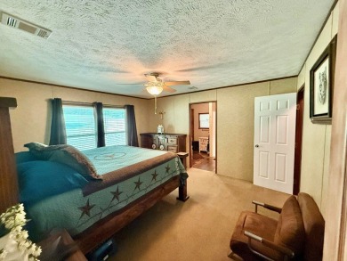 Lakeside Retreat: Spacious Home on 3.9 Acres Near Lake Sam on Rayburn Country Club in Texas - for sale on GolfHomes.com, golf home, golf lot