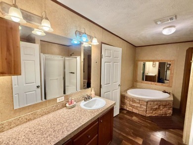Lakeside Retreat: Spacious Home on 3.9 Acres Near Lake Sam on Rayburn Country Club in Texas - for sale on GolfHomes.com, golf home, golf lot
