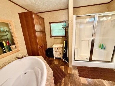 Lakeside Retreat: Spacious Home on 3.9 Acres Near Lake Sam on Rayburn Country Club in Texas - for sale on GolfHomes.com, golf home, golf lot