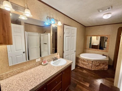 Lakeside Retreat: Spacious Home on 3.9 Acres Near Lake Sam on Rayburn Country Club in Texas - for sale on GolfHomes.com, golf home, golf lot