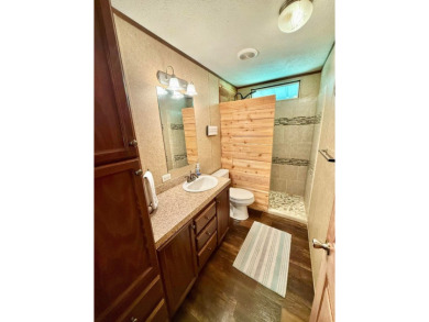 Lakeside Retreat: Spacious Home on 3.9 Acres Near Lake Sam on Rayburn Country Club in Texas - for sale on GolfHomes.com, golf home, golf lot