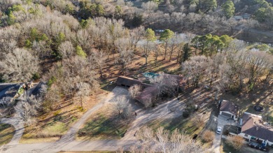 Experience lakeside living at its finest in this unique 4,100sf on Lions Den Golf Club in Arkansas - for sale on GolfHomes.com, golf home, golf lot