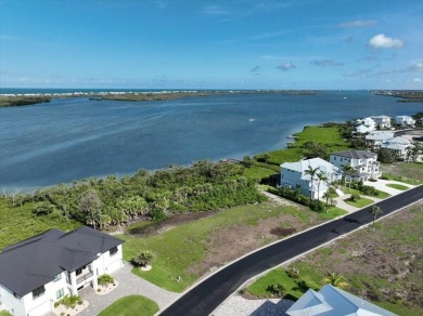 WATERFRONT LOT - ICW WATERS.  A Gated Community that is more on Lemon Bay Golf Club in Florida - for sale on GolfHomes.com, golf home, golf lot
