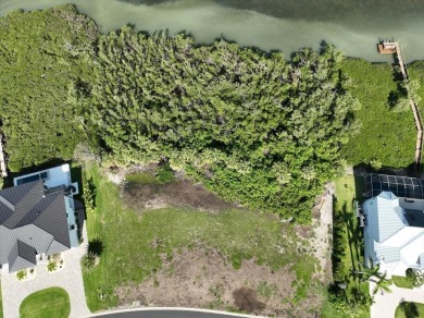 WATERFRONT LOT - ICW WATERS.  A Gated Community that is more on Lemon Bay Golf Club in Florida - for sale on GolfHomes.com, golf home, golf lot