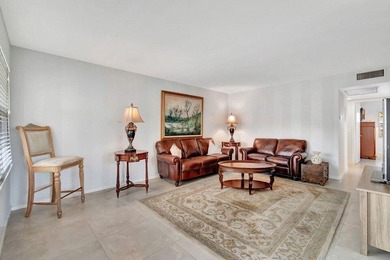 Beautifully appointed Corner unit with Central AC is offered for on Southwinds Golf Course in Florida - for sale on GolfHomes.com, golf home, golf lot