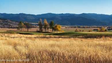 Located near the green of the third hole along the Hale Irwin on Teton Reserve in Idaho - for sale on GolfHomes.com, golf home, golf lot