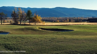 Located near the green of the third hole along the Hale Irwin on Teton Reserve in Idaho - for sale on GolfHomes.com, golf home, golf lot