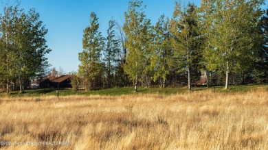 Located near the green of the third hole along the Hale Irwin on Teton Reserve in Idaho - for sale on GolfHomes.com, golf home, golf lot