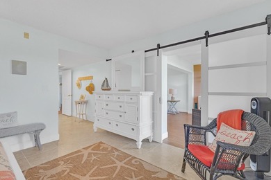 Welcome to your dream coastal retreat! This top-floor 2 bedroom on Ocean Village Golf Course in Florida - for sale on GolfHomes.com, golf home, golf lot