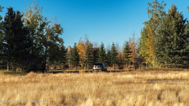 Located near the green of the third hole along the Hale Irwin on Teton Reserve in Idaho - for sale on GolfHomes.com, golf home, golf lot