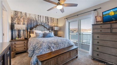 Beautifully updated lakefront home at the 3MM in the highly on Seasons Ridge At Four Seasons in Missouri - for sale on GolfHomes.com, golf home, golf lot