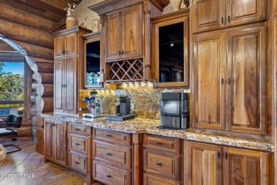 MAGNIFICENT, TURN-KEY FURNISHED FULL LOG CABIN, BACKING NATIONAL on Torreon Golf Club in Arizona - for sale on GolfHomes.com, golf home, golf lot