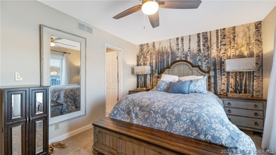 Beautifully updated lakefront home at the 3MM in the highly on Seasons Ridge At Four Seasons in Missouri - for sale on GolfHomes.com, golf home, golf lot