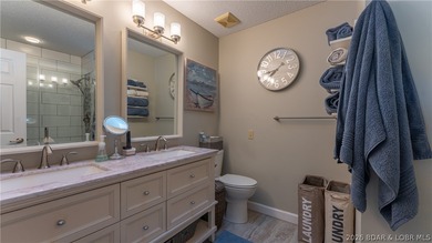 Beautifully updated lakefront home at the 3MM in the highly on Seasons Ridge At Four Seasons in Missouri - for sale on GolfHomes.com, golf home, golf lot