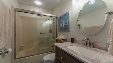 Beautifully updated lakefront home at the 3MM in the highly on Seasons Ridge At Four Seasons in Missouri - for sale on GolfHomes.com, golf home, golf lot