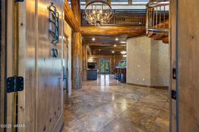 MAGNIFICENT, TURN-KEY FURNISHED FULL LOG CABIN, BACKING NATIONAL on Torreon Golf Club in Arizona - for sale on GolfHomes.com, golf home, golf lot