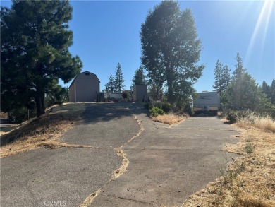 GOLF COURSE FRONTAGE lot with improvements of septic system on Adam Springs Golf Course in California - for sale on GolfHomes.com, golf home, golf lot