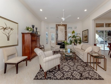 Exuding refined sophistication, this exceptional courtyard on The Venice Golf and Country Club in Florida - for sale on GolfHomes.com, golf home, golf lot