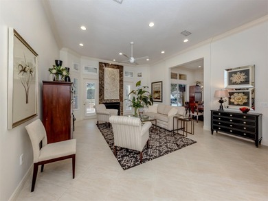 Exuding refined sophistication, this exceptional courtyard on The Venice Golf and Country Club in Florida - for sale on GolfHomes.com, golf home, golf lot