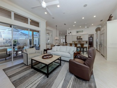 Exuding refined sophistication, this exceptional courtyard on The Venice Golf and Country Club in Florida - for sale on GolfHomes.com, golf home, golf lot