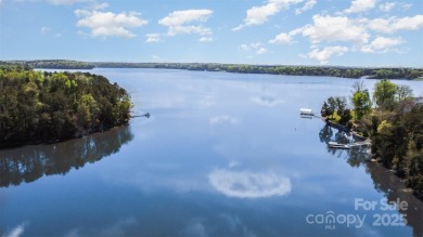 Breathtaking lakefront views from nearly every room in this on Edgewater Golf Club in South Carolina - for sale on GolfHomes.com, golf home, golf lot