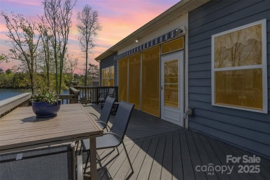 Breathtaking lakefront views from nearly every room in this on Edgewater Golf Club in South Carolina - for sale on GolfHomes.com, golf home, golf lot