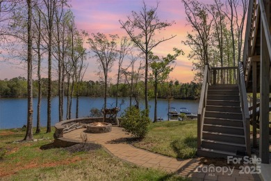 Breathtaking lakefront views from nearly every room in this on Edgewater Golf Club in South Carolina - for sale on GolfHomes.com, golf home, golf lot