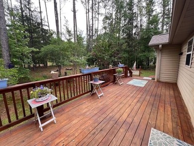 Your Perfect Savannah Lakes Retreat Escape to 105 Arbor Lane, a on Monticello Golf Club At Savannah Lakes in South Carolina - for sale on GolfHomes.com, golf home, golf lot