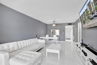Beautifully updated 2nd-floor condo offering 1 bedroom, 1.5 on Pine Island Ridge Country Club in Florida - for sale on GolfHomes.com, golf home, golf lot