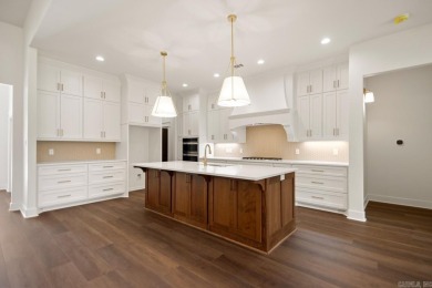This inviting home is located a 219 Arlington Park Terrace in on Hot Springs Golf and Country Club in Arkansas - for sale on GolfHomes.com, golf home, golf lot