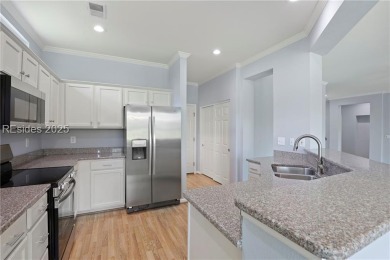 Impeccably maintained, this Hamilton Jefferson model offers on Okatie Creek Golf Club in South Carolina - for sale on GolfHomes.com, golf home, golf lot
