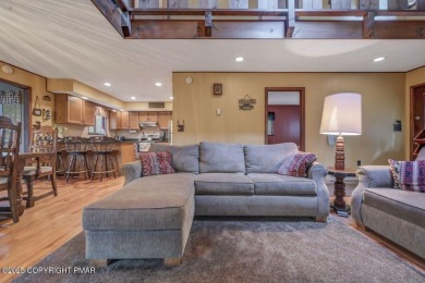 Discover the perfect blend of comfort and charm in this on Lake Naomi Timber Trails Golf Club in Pennsylvania - for sale on GolfHomes.com, golf home, golf lot