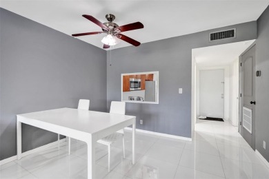 Beautifully updated 2nd-floor condo offering 1 bedroom, 1.5 on Pine Island Ridge Country Club in Florida - for sale on GolfHomes.com, golf home, golf lot