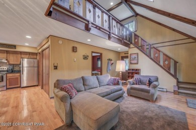 Discover the perfect blend of comfort and charm in this on Lake Naomi Timber Trails Golf Club in Pennsylvania - for sale on GolfHomes.com, golf home, golf lot