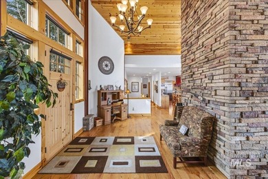 Perched above the fairways of Meadow Creek Golf Course, this on Meadowcreek Golf Resort in Idaho - for sale on GolfHomes.com, golf home, golf lot