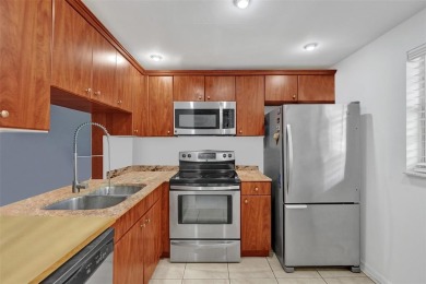 Beautifully updated 2nd-floor condo offering 1 bedroom, 1.5 on Pine Island Ridge Country Club in Florida - for sale on GolfHomes.com, golf home, golf lot