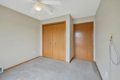 Welcome to this fantastic two-bedroom, one-bathroom condo on Centennial Oaks Golf Club in Iowa - for sale on GolfHomes.com, golf home, golf lot
