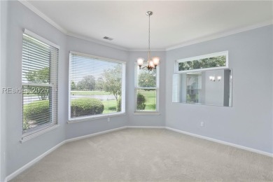 Impeccably maintained, this Hamilton Jefferson model offers on Okatie Creek Golf Club in South Carolina - for sale on GolfHomes.com, golf home, golf lot