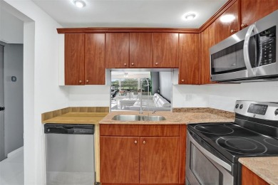 Beautifully updated 2nd-floor condo offering 1 bedroom, 1.5 on Pine Island Ridge Country Club in Florida - for sale on GolfHomes.com, golf home, golf lot